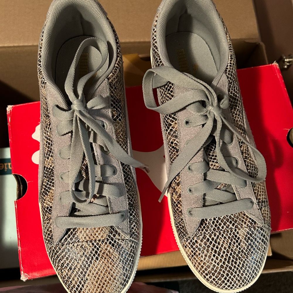Women’s snake Puma platform sneakers.